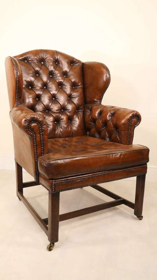 18th century large leather upholstered wingback armchair, Georgian