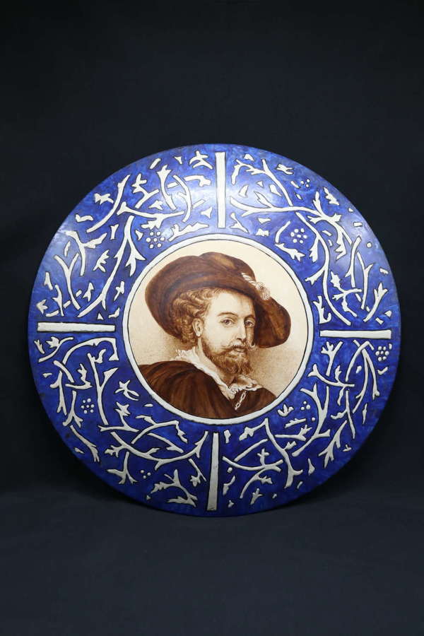 Continental hand painted pottery plaque depicting Rubens, circa 1900