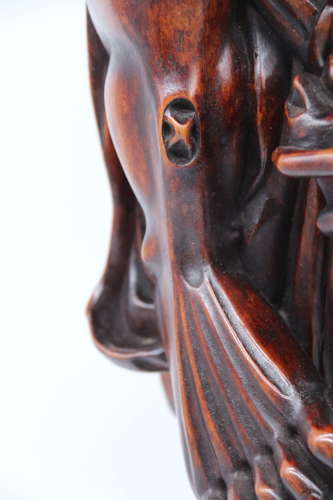 Late 19th C Japanese carved hardwood Okimono of a man, circa 1890