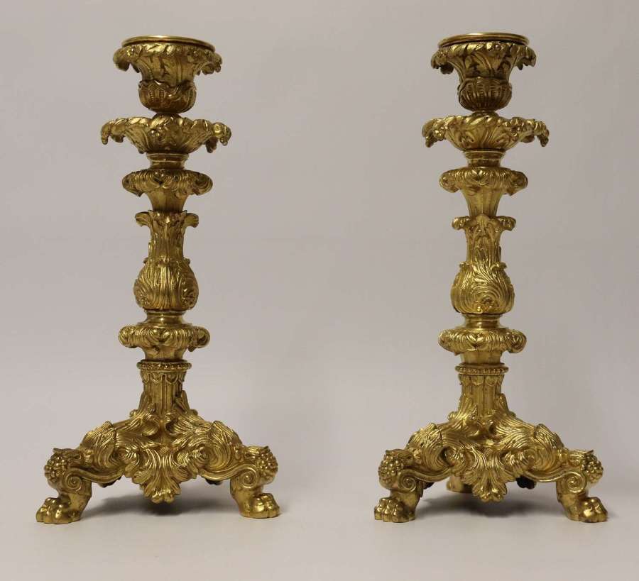 An exquisite pair of early 19th C French ormolu candlesticks C 1830