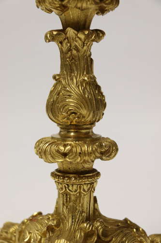 An exquisite pair of early 19th C French ormolu candlesticks C 1830