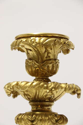 An exquisite pair of early 19th C French ormolu candlesticks C 1830