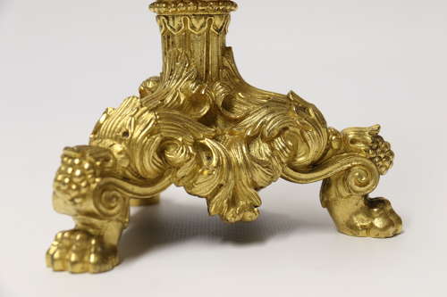 An exquisite pair of early 19th C French ormolu candlesticks C 1830