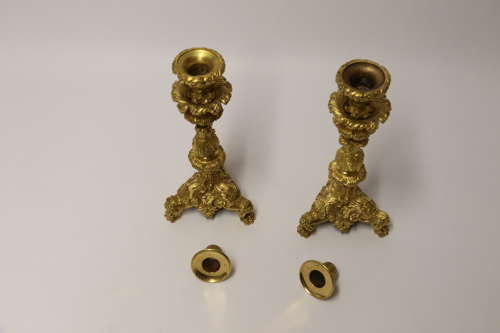 An exquisite pair of early 19th C French ormolu candlesticks C 1830