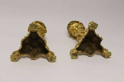 An exquisite pair of early 19th C French ormolu candlesticks C 1830