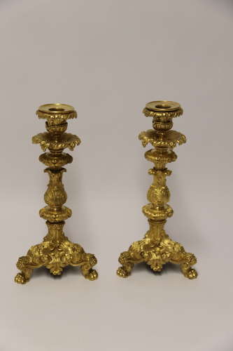 An exquisite pair of early 19th C French ormolu candlesticks C 1830