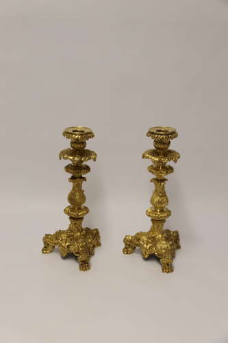 An exquisite pair of early 19th C French ormolu candlesticks C 1830