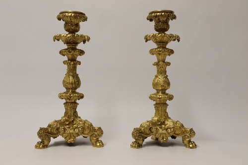 An exquisite pair of early 19th C French ormolu candlesticks C 1830