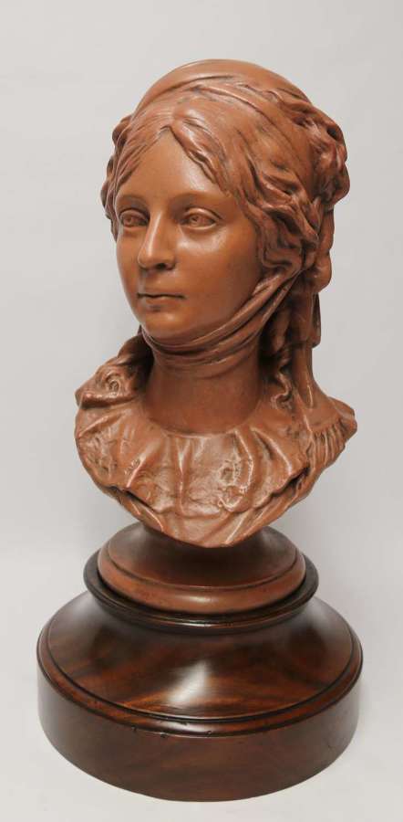 A large French terracotta bust of a beautiful medieval maiden, C 1910