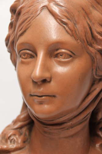 A large French terracotta bust of a beautiful medieval maiden, C 1910