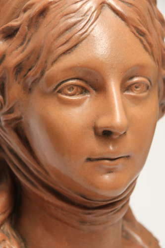 A large French terracotta bust of a beautiful medieval maiden, C 1910