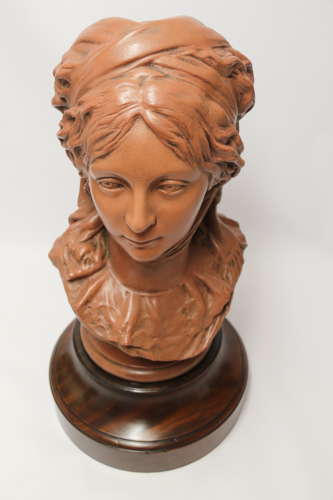 A large French terracotta bust of a beautiful medieval maiden, C 1910