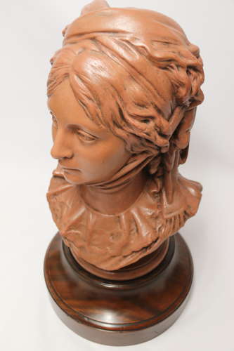 A large French terracotta bust of a beautiful medieval maiden, C 1910
