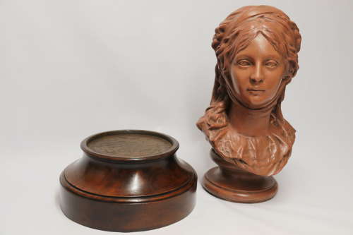 A large French terracotta bust of a beautiful medieval maiden, C 1910