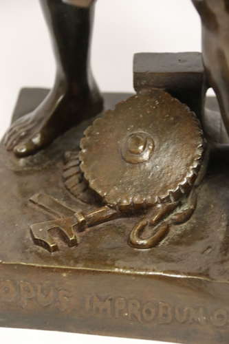 A late 19th C bronze sculpture of a blacksmith by E L Picault