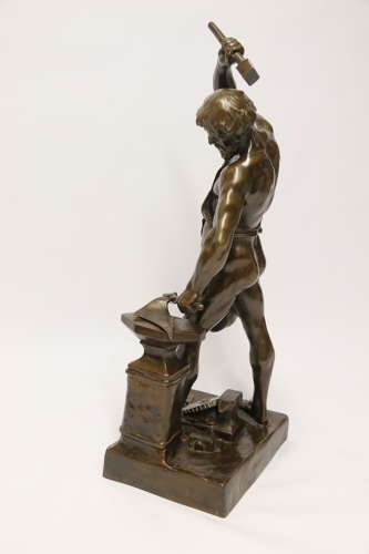 A late 19th C bronze sculpture of a blacksmith by E L Picault