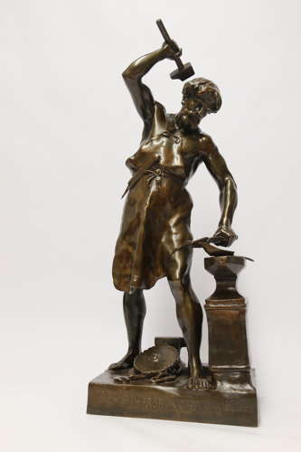 A late 19th C bronze sculpture of a blacksmith by E L Picault