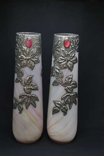 A large pair of Art Nouveau vases with pewter overlayed decoration