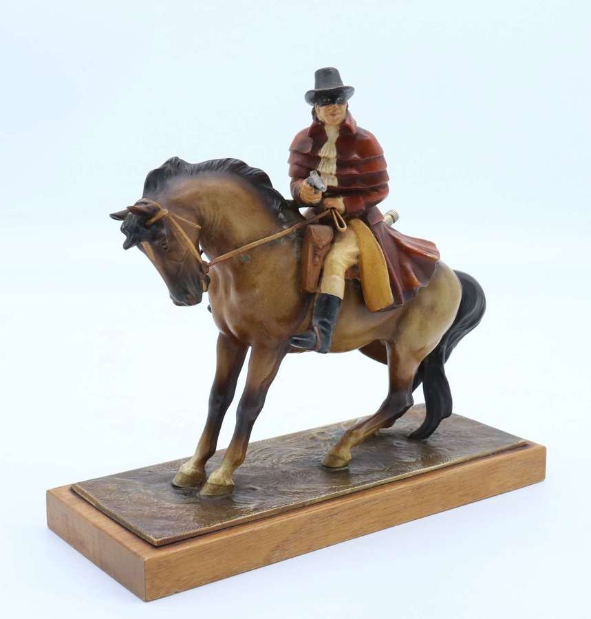 A rare Art Deco table cigarette lighter in the form of Dick Turpin
