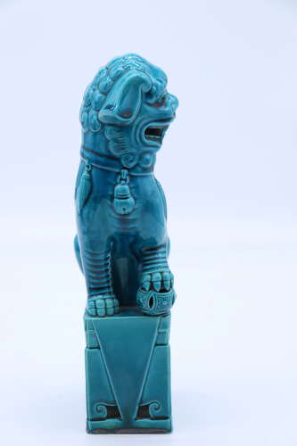 A pair of porcelain Chinese Buddhist Temple lions or foo dogs C 1900