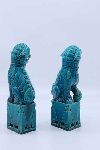 A pair of porcelain Chinese Buddhist Temple lions or foo dogs C 1900