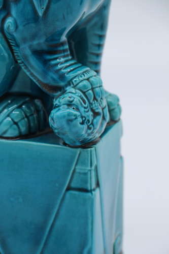 A pair of porcelain Chinese Buddhist Temple lions or foo dogs C 1900