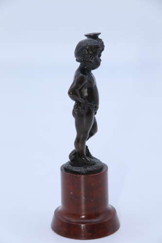 A pair of 19th century bronze putti figures on marble bases circa 1860