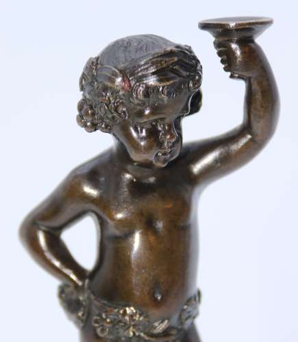 A pair of 19th century bronze putti figures on marble bases circa 1860