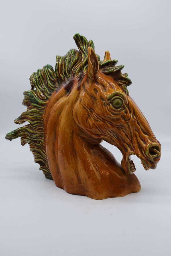 A 1940s Italian pottery sculpture of a frenzied stallion