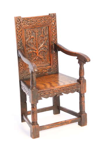 A miniature country oak panelled and carved wainscot armchair, C1900