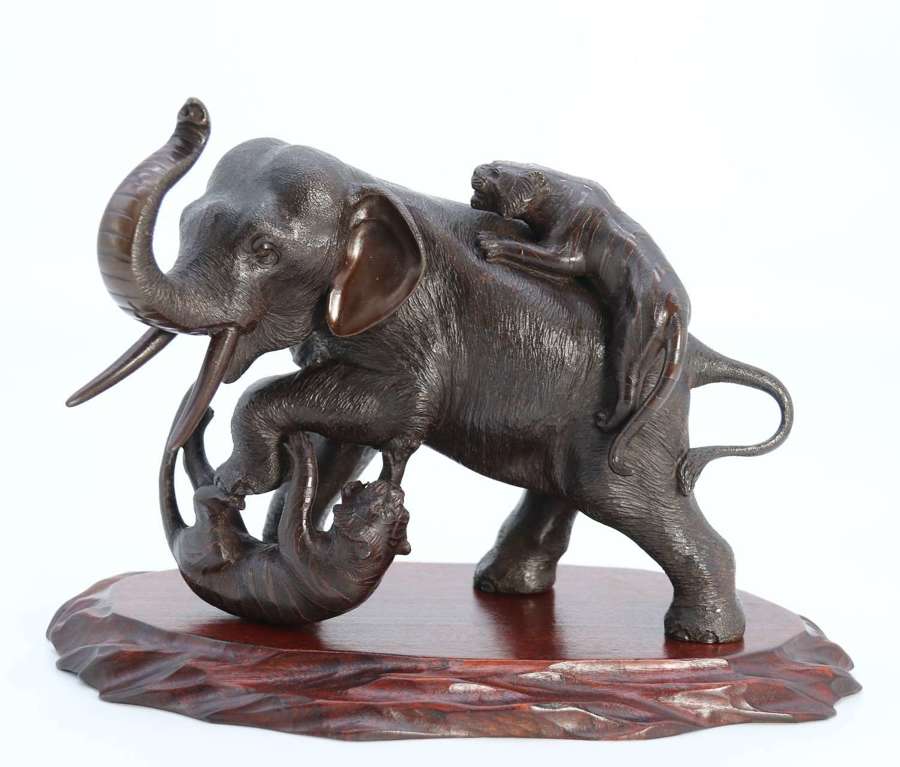19th century Japanese Meiji period bronze elephant with two tigers