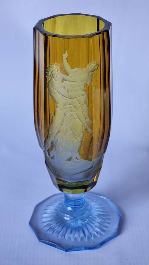 Hand cut intaglio drinking glass depicting Samson and          Delilah