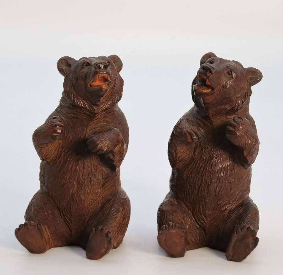 A rare pair of fine Black Forest hand carved linden wood bears c1900