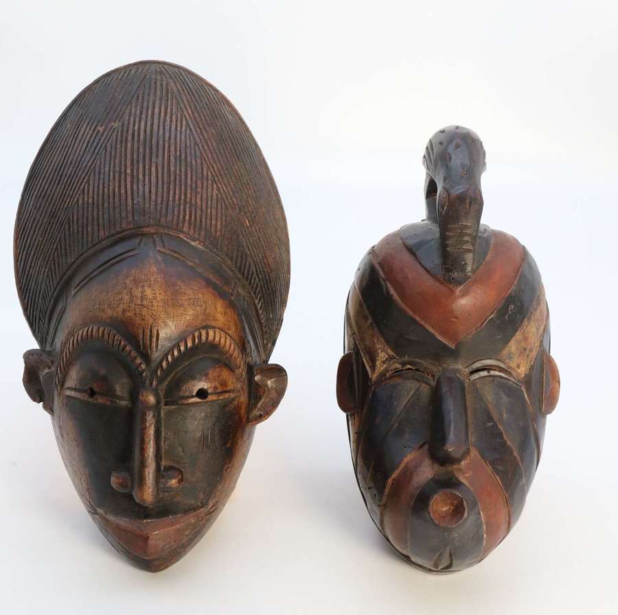 A matched pair of African tribal dance face masks, circa 1920