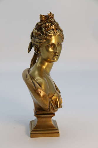 A 19th century gilt bronze bust of Diana the Huntress after J A Houdon
