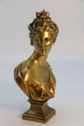 A 19th century gilt bronze bust of Diana the Huntress after J A Houdon