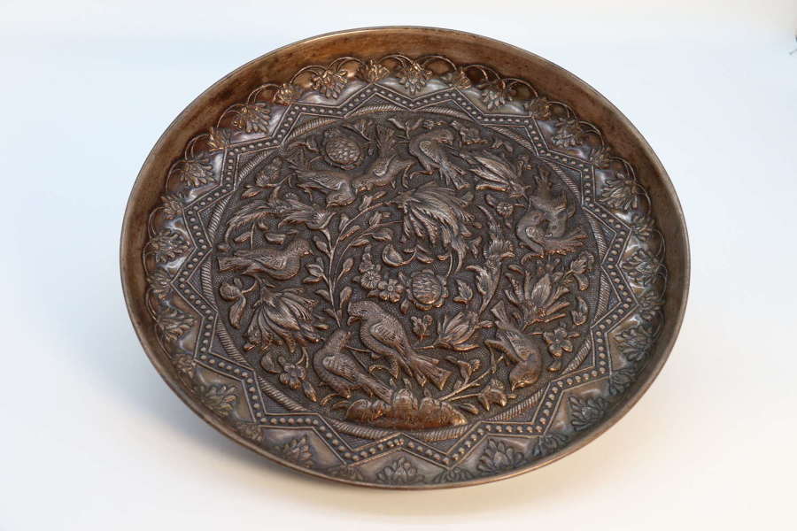 An Indian Raj period heavy copper repousse worked charger, c 1900