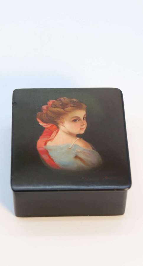 A Russian lacquered box hand painted with a portrait of a lady C 1920