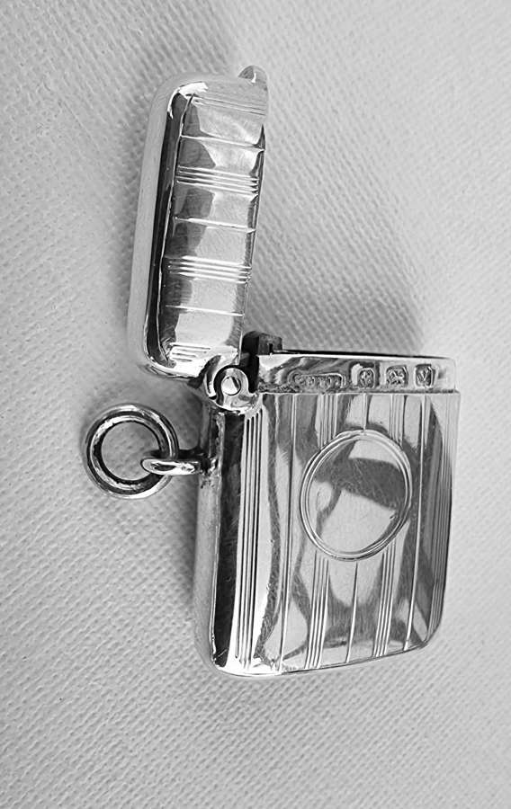 An English hallmarked silver Vesta case by W H Haseler 1920/21