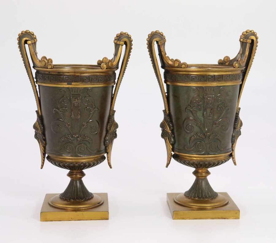 Empire period bronze and ormolu Grecian style pair of classical urns.