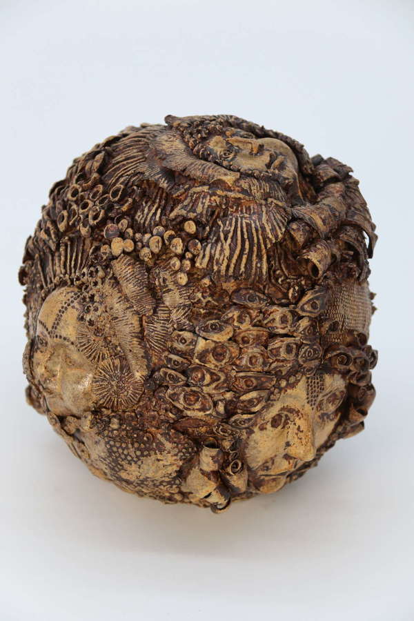Studio pottery mythical sculpture of the many faces of sea urchins