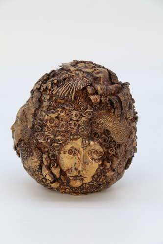 Studio pottery mythical sculpture of the many faces of sea urchins