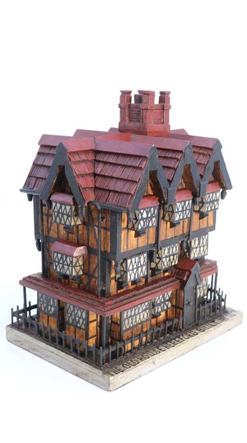 A Folk Art painted model of a Hereford house made from matchsticks