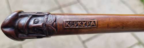19th century olivewood walking stick with a equestrian carved handle