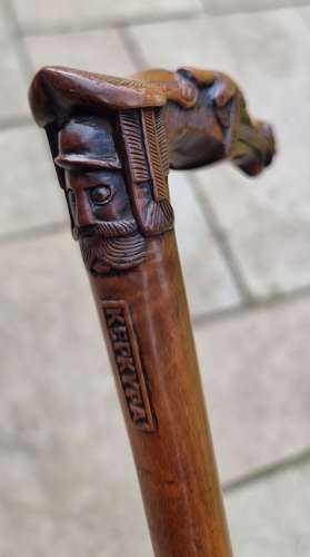 19th century olivewood walking stick with a equestrian carved handle