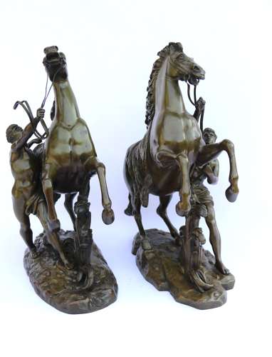 A large pair of 19th century French bronze Marly Horses after Coustou.
