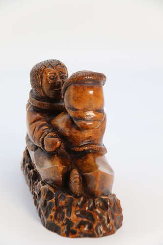 Canadian folk art Inuit figure group made from maple circa 1920