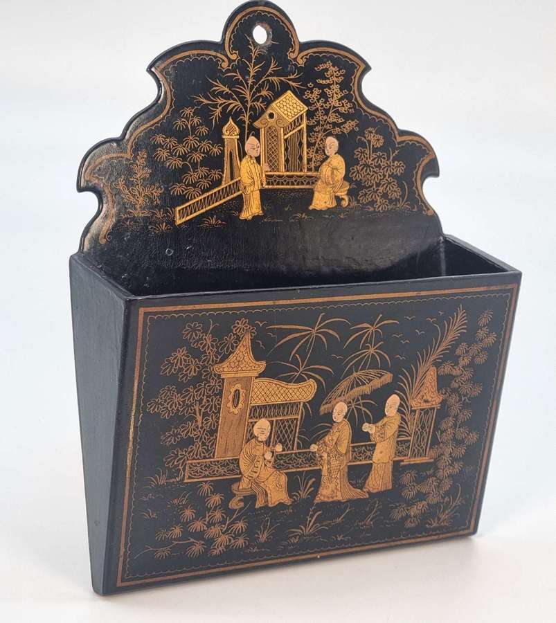 A 19th century Chinese chinoiserie decorated papier Mache wall pocket