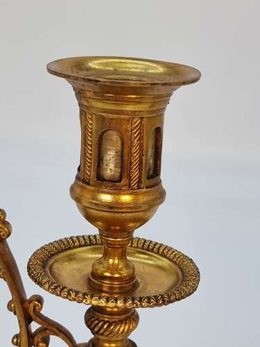 A pair of 19th century French gilt bronze candlesticks, circa 1870