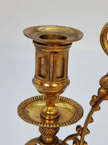 A pair of 19th century French gilt bronze candlesticks, circa 1870